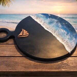 Ocean Wave charcuterie board with wooden sailboat design 14x14”